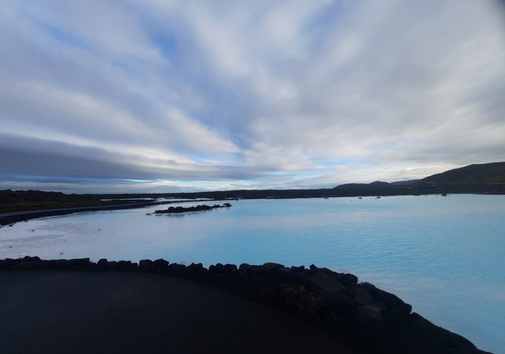 The blue pool at the entrance of the Blue Lagoon, a thermal treasure, on the Southern peninsula of Iceland. It show the beautiful blue colour of the water.