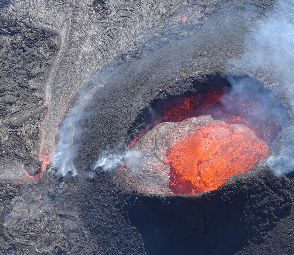 View from above of the Sundhnjúkagígur crater of the May 2024 eruption. Showing the vulcanic activity. You can see the red/orange lava move within the crater.