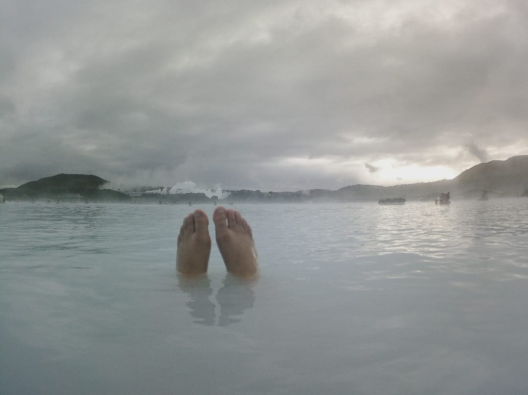 Feet sticking out of water