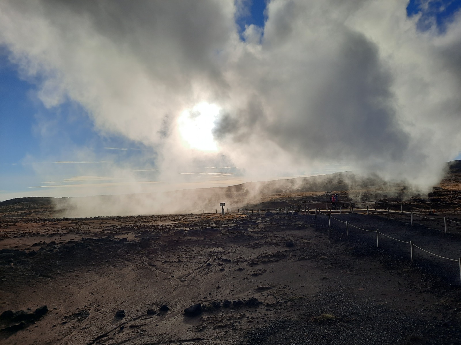 Hot Springs with sun shining through the clouds